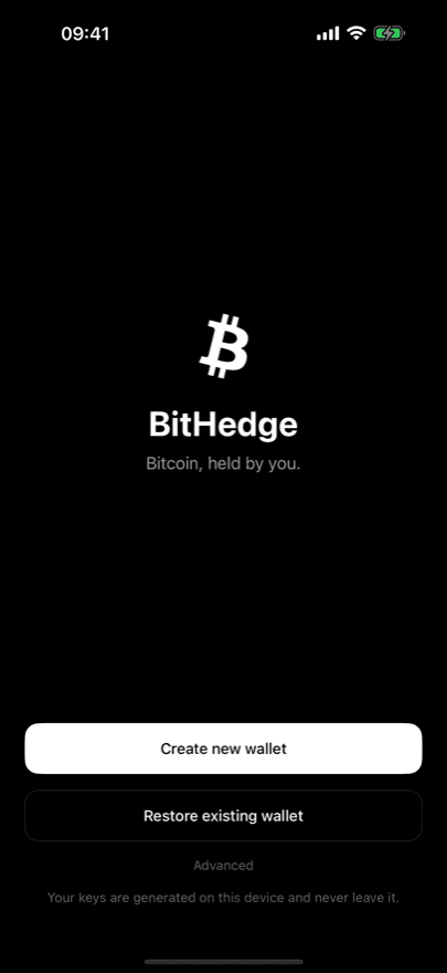BitHedge welcome screen on iPhone offering to create a new Bitcoin wallet or restore an existing one from a recovery phrase