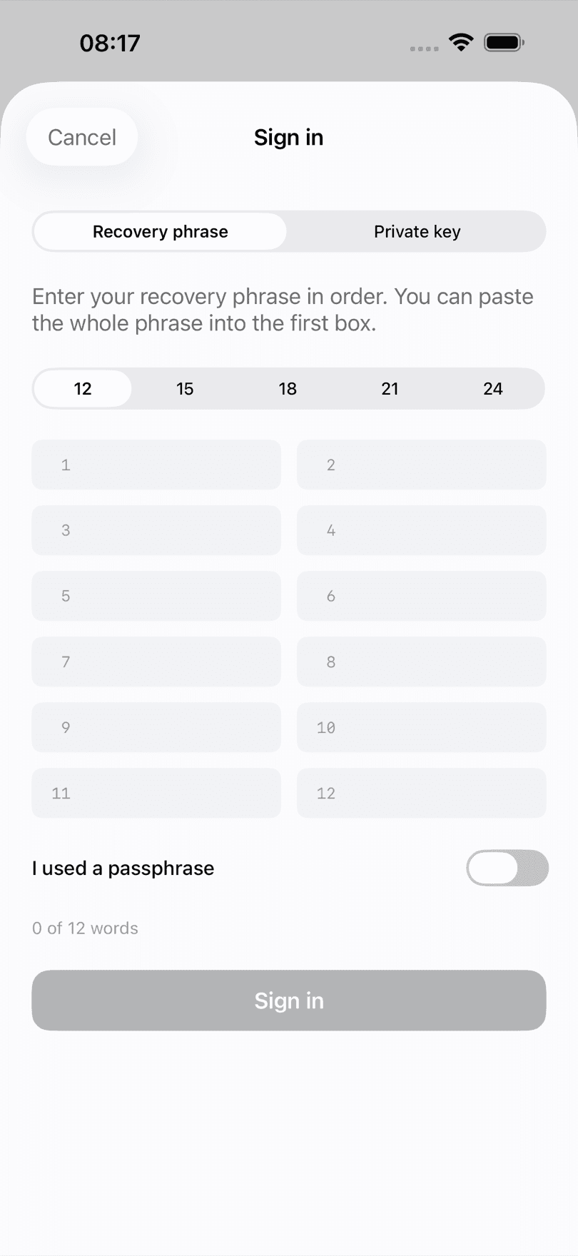₿21 Wallet sign-in screen on iPhone with tabs for a recovery phrase or a private key, a word count from 12 to 24, twelve numbered word fields and a passphrase toggle