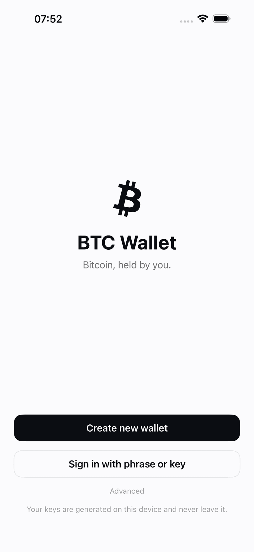BTC Wallet welcome screen on iPhone offering to create a new Bitcoin wallet or sign in with an existing recovery phrase or private key